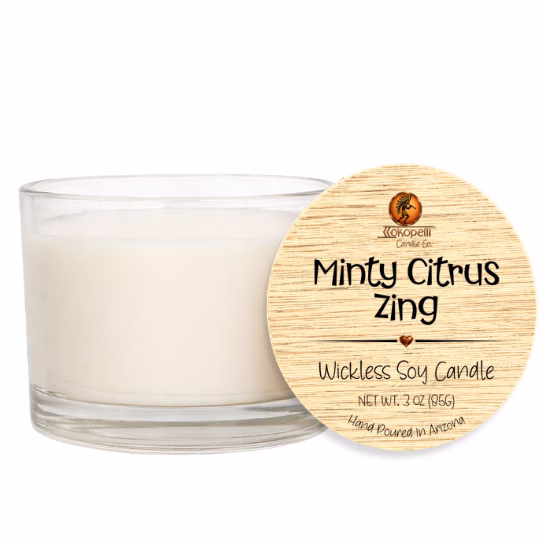 Minty Citrus Zing wickless soy candle in a clear glass vessel displayed with a white background