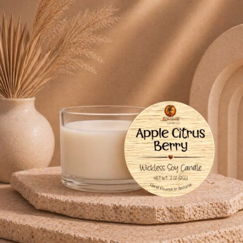 3 oz Apple Citrus Berry wickless soy candle with natural bamboo lid displayed on a stone pedestal in a warm Southwest-inspired setting, handcrafted by Kokopelli Candle Co. in Arizona.