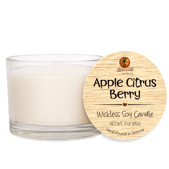 Apple Citrus Berry wickless soy candle in a clear glass vessel with creamy white soy wax and a natural wood lid, hand poured in Arizona.