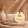 3 oz Fruit Slices wickless soy candle with natural bamboo lid displayed on a stone pedestal in a warm Southwest-inspired setting, handcrafted by Kokopelli Candle Co. in Arizona.