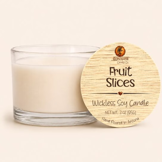 Fruit Slices wickless soy candle in a clear glass vessel with creamy white soy wax and a natural wood lid, hand poured in Arizona.