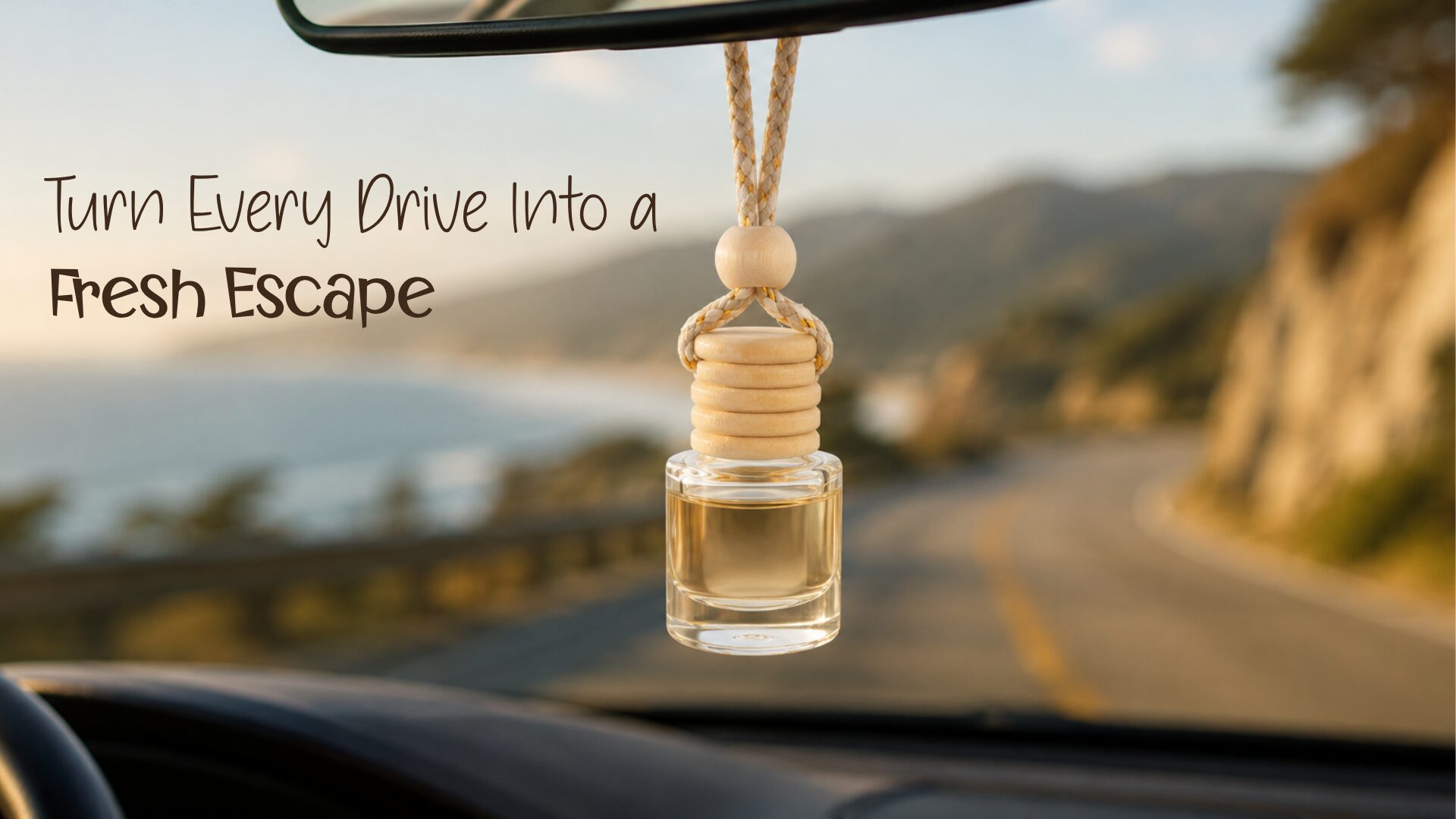 Car diffuser hanging from a rearview mirror with golden fragrance oil and a scenic blurred road view through the windshield.