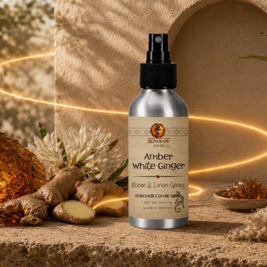 Amber White Ginger Room & Linen Spray by Kokopelli Candle Co displayed with fresh ginger, glowing amber accents, and warm Southwest-inspired décor.