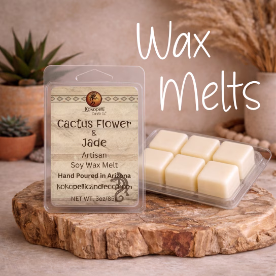Amber White Ginger wax melt clamshell on petrified wood slab with creamy soy wax cubes in a warm desert-inspired setting